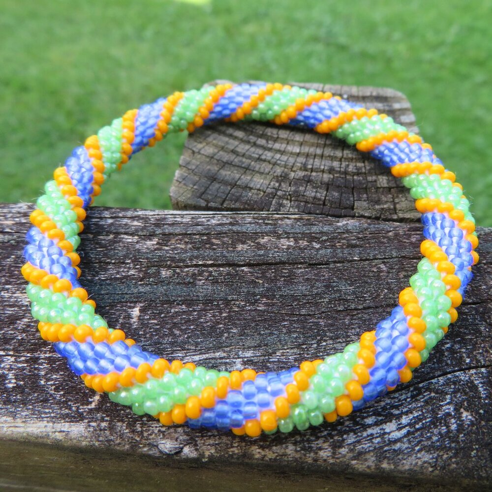 NWOT Nepal Roll On Bracelet Crochet Halloween Orange Purple Green